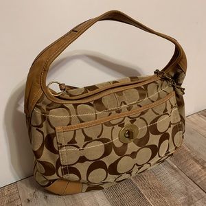 COACH signature Tote Handbag Size Medium to Large with gold accents